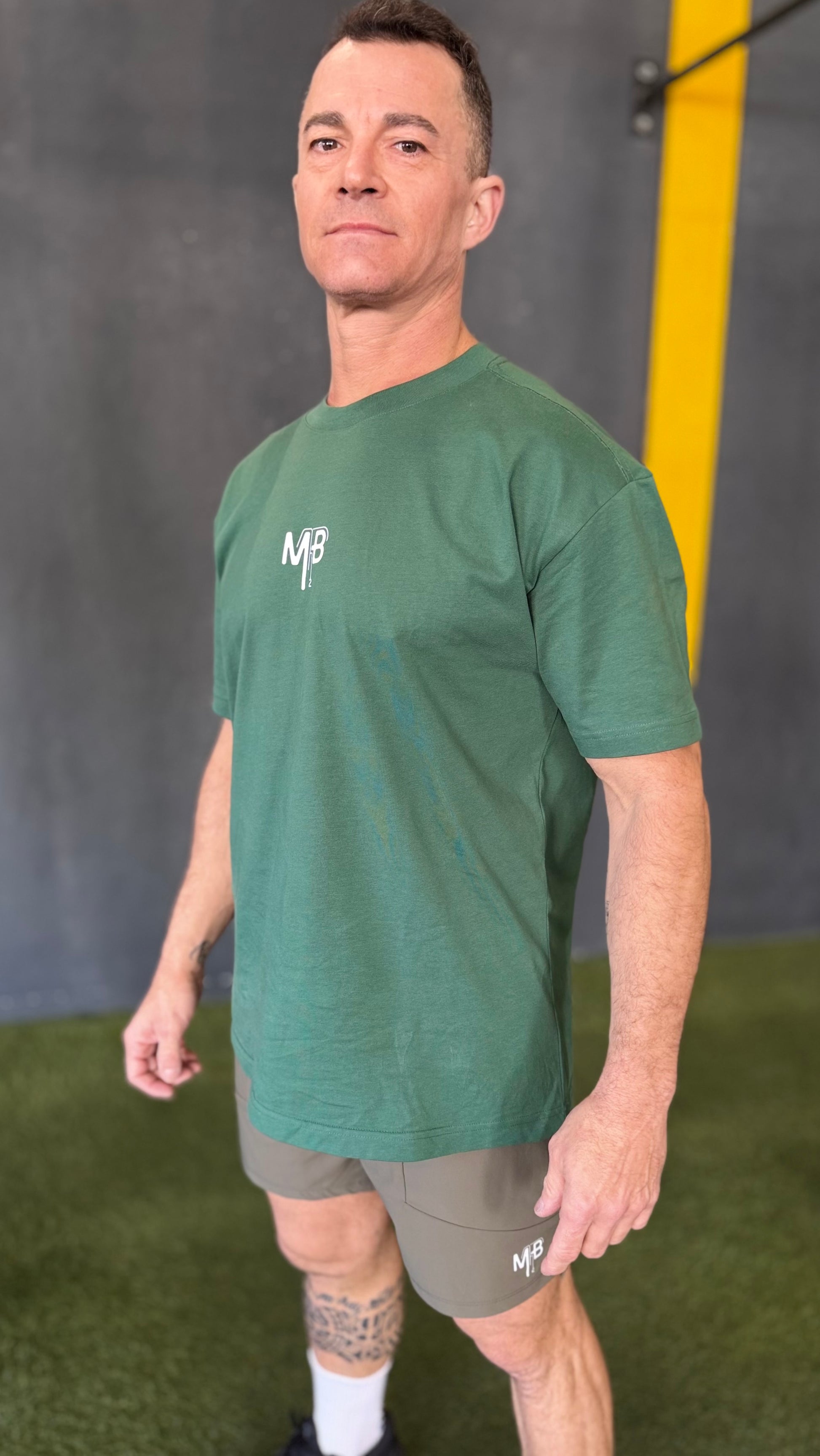 Camiseta Oversize verde botella Ambitiou2.0